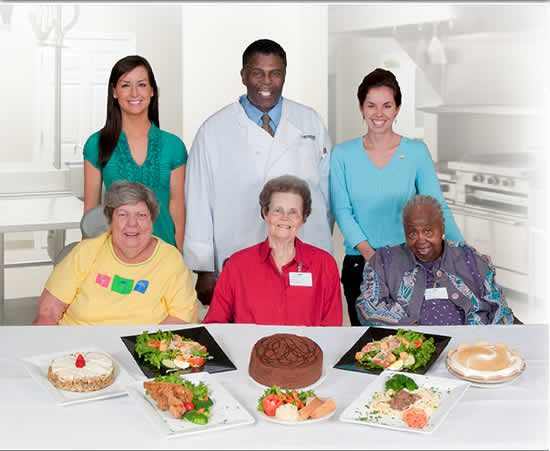 food service committee in front of kitchen